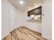 Dining area featuring hardwood floors and modern lighting at 2949 Shady Holw, Boulder, CO 80304