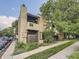 Exterior view of a two-story condo with private balcony and manicured landscaping at 2949 Shady Holw, Boulder, CO 80304