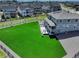 Aerial view of a home with a spacious backyard and patio at 22593 E Piccolo Way, Aurora, CO 80016