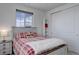 Inviting bedroom features lots of natural light with a rustic decor at 22593 E Piccolo Way, Aurora, CO 80016