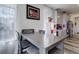 Cozy dining area adjacent to the kitchen, featuring a modern table and comfortable seating with natural light at 22593 E Piccolo Way, Aurora, CO 80016