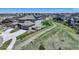 Aerial view of a home, yard and neighborhood at 22593 E Piccolo Way, Aurora, CO 80016