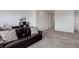 Inviting living room showcasing comfortable seating and ample space for relaxation and decor at 22593 E Piccolo Way, Aurora, CO 80016