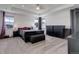 Spacious main bedroom suite with tray ceiling, dual dressers and ample closet space at 22593 E Piccolo Way, Aurora, CO 80016
