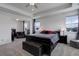 Large main bedroom featuring a spacious layout, comfortable seating, and ample natural light at 22593 E Piccolo Way, Aurora, CO 80016