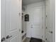 Organized mudroom with built-in bench and storage, with direct access to the home's interior at 22593 E Piccolo Way, Aurora, CO 80016