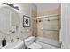 Bright bathroom with pedestal sink and glass enclosed tub-shower at 45 N Ogden St # 201, Denver, CO 80218