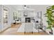 Bright living room with fireplace, plush seating, and hardwood floors at 45 N Ogden St # 201, Denver, CO 80218