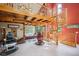 Unique interior showcasing a spiral staircase, vintage barber chairs, and a relaxing hot tub at 24999 Grandview Ave, Golden, CO 80401