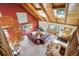 Inviting living room featuring a spiral staircase, comfortable seating, and natural light at 24999 Grandview Ave, Golden, CO 80401