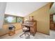 Study featuring vintage roll-top desk, mountain view and cozy atmosphere at 24999 Grandview Ave, Golden, CO 80401