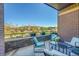 Relaxing outdoor patio with comfortable seating and scenic neighborhood views in a desirable location at 6619 E Lowry Blvd # 112, Denver, CO 80230