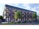 Apartment building featuring balconies, modern architecture, and well-maintained landscaping at 1652 N Lafayette St # 2, Denver, CO 80218