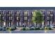 Apartment building featuring balconies, modern architecture, and well-maintained landscaping at 1652 N Lafayette St # 2, Denver, CO 80218