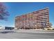 University Park Tower building exterior, showcasing its multi-story design and numerous balconies at 2225 Buchtel Blvd # 1109, Denver, CO 80210