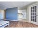 White kitchen cabinets and appliances, visible from the living room at 2225 Buchtel Blvd # 1109, Denver, CO 80210