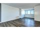 Spacious living room with hardwood floors and large windows at 2225 Buchtel Blvd # 1109, Denver, CO 80210