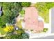 Aerial view showcases landscaped yard with koi pond, mature trees, a deck, and trampoline at 3253 S King Way, Denver, CO 80236