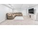 Spacious finished basement featuring neutral decor and carpet at 3253 S King Way, Denver, CO 80236