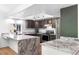 Modern kitchen with marble countertops, stainless steel appliances, and ample cabinet space at 3253 S King Way, Denver, CO 80236
