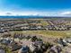 Panoramic aerial view of a residential area, highlighting the community's layout and surrounding landscape at 8198 S Sicily Ct, Aurora, CO 80016