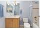 This full bathroom has a vanity, updated fixtures, and a shower/tub combo at 8198 S Sicily Ct, Aurora, CO 80016