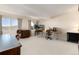 Large bonus room with abundant natural light that offers versatile space for work or recreation at 8198 S Sicily Ct, Aurora, CO 80016