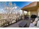 Spacious outdoor deck with a seating area and a grill, perfect for enjoying the outdoor views at 8198 S Sicily Ct, Aurora, CO 80016