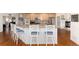 Beautiful kitchen with granite countertops, breakfast bar, and stainless appliances at 8198 S Sicily Ct, Aurora, CO 80016
