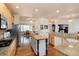 Spacious kitchen with granite countertops, stainless steel appliances and a center island at 8198 S Sicily Ct, Aurora, CO 80016