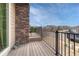 Balcony with wrought iron railings and neighborhood views at 14902 E Poundstone Dr, Aurora, CO 80015