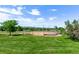 Community baseball field surrounded by a green field, perfect for outdoor games at 12183 W Chenango Dr, Morrison, CO 80465