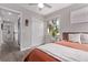 Comfortable bedroom featuring a neutral color palette and a large window for natural light at 12183 W Chenango Dr, Morrison, CO 80465