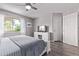 Bedroom featuring nice natural light, ceiling fan, and great floors at 12183 W Chenango Dr, Morrison, CO 80465