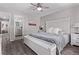 The bedroom has a walk-in closet and an attached bathroom at 12183 W Chenango Dr, Morrison, CO 80465