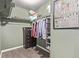 Walk-in closet with built-in shelving and clothing racks for organization at 12183 W Chenango Dr, Morrison, CO 80465