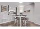 Cozy dining area adjacent to the kitchen with a charming view at 12183 W Chenango Dr, Morrison, CO 80465