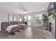 Inviting living room featuring a comfortable sectional sofa, fireplace, and sliding glass doors to a deck at 12183 W Chenango Dr, Morrison, CO 80465