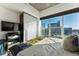 Spacious bedroom with city views, and a queen-size bed at 891 14Th St # 2816, Denver, CO 80202