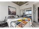Well-lit bedroom with city views and a queen-size bed at 891 14Th St # 2816, Denver, CO 80202