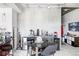 Modern dining area with sleek furniture, industrial-style accents, and close proximity to the kitchen space at 891 14Th St # 2816, Denver, CO 80202
