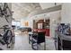 Open concept dining area features a glass table and chairs, with a view into the kitchen and living area at 891 14Th St # 2816, Denver, CO 80202