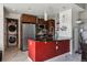 Modern kitchen with dark cabinets and a granite countertop at 891 14Th St # 2816, Denver, CO 80202