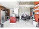 Open concept kitchen featuring modern appliances, a large island, and a cozy dining area with stylish decor at 891 14Th St # 2816, Denver, CO 80202