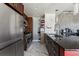 Sleek kitchen featuring stainless steel appliances and dark counters at 891 14Th St # 2816, Denver, CO 80202