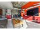 Modern living room with red accents and city views at 891 14Th St # 2816, Denver, CO 80202