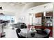 Bright living room featuring modern decor, city views, and an open layout to the kitchen area at 891 14Th St # 2816, Denver, CO 80202