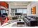 Open living area featuring city views and modern furnishings at 891 14Th St # 2816, Denver, CO 80202