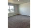 Bright bedroom features a neutral color palette and plush carpeting at 22037 E 39Th Pl, Aurora, CO 80019