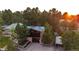 Charming two-story home with a screened-in porch, a carport, and well-maintained landscaping at 1059 S Elbert St, Elizabeth, CO 80107